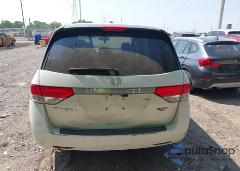 2014 Honda Odyssey Ex-L z USA, uszkodzony, nr VIN 5FNRL5H63EB131596